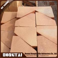 Arch brick for furnace door